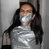 Tape Gagged Girl In Mummification Bondage