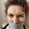 Pissed woman gagged with tape